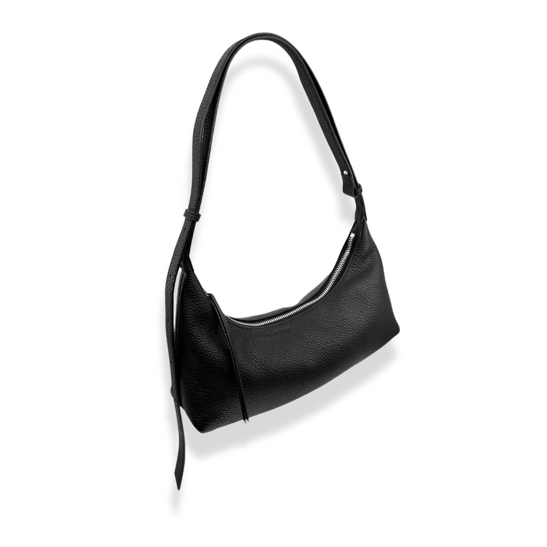 Black handbag on a white background