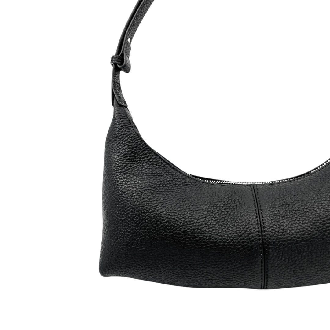 Black leather handbag on a white background