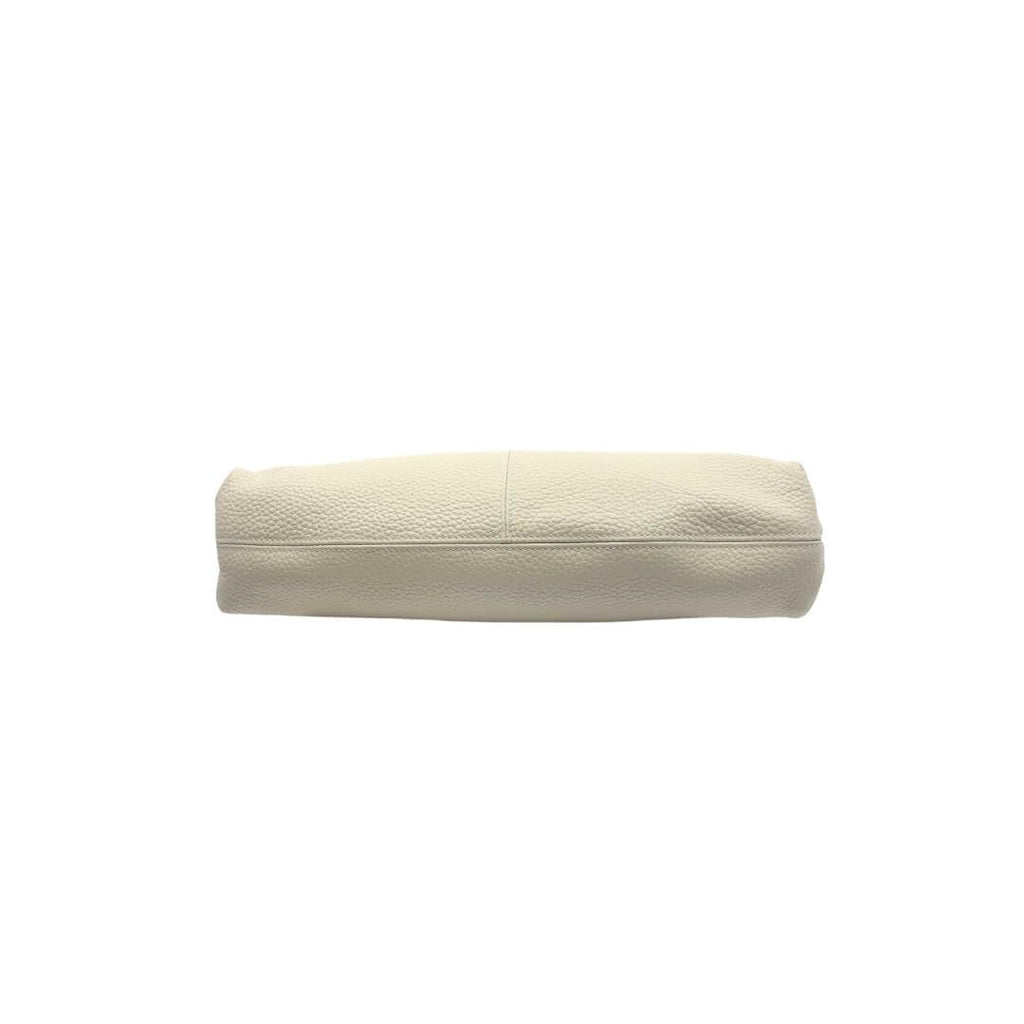 Bottom of ivory ash handbag on a white background