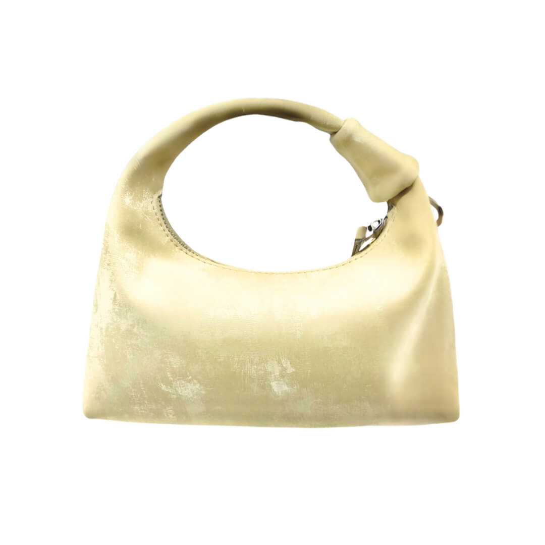 Golden yellow handbag on a white background