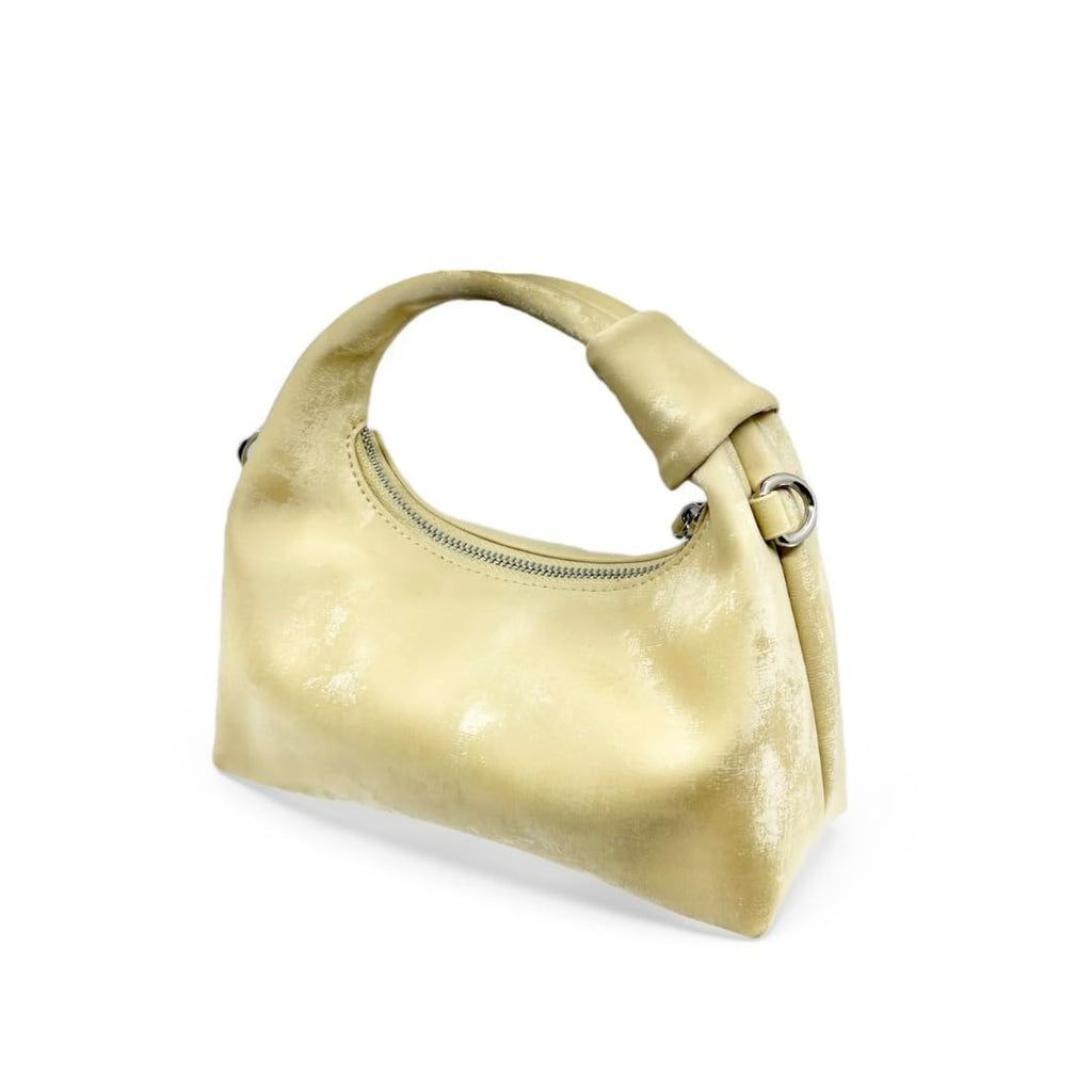 Golden yellow handbag on a white background