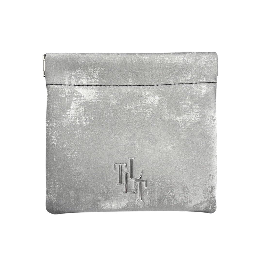 Silver textured pouch with a logo on a white background